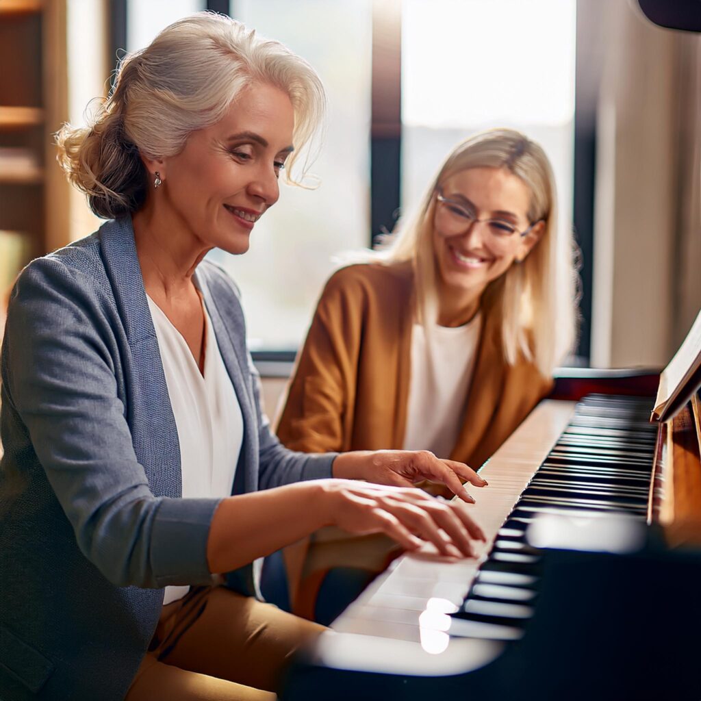 lezioni di pianoforte tra un insegnante e uno studente adulto